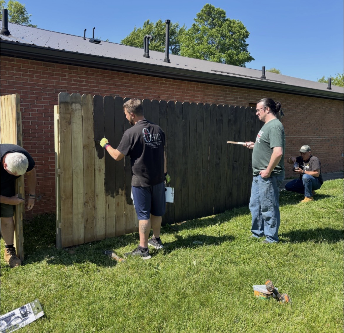 Men of Faith serving together during an outdoor church work project
